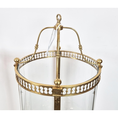 351 - CYLINDRICAL HALL LANTERNS, a pair, of large scale, gilt brass and glass, 130cm H x 55cm W. (2)