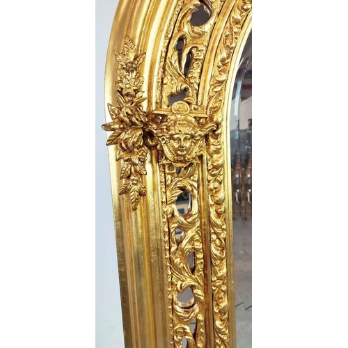 352 - OVERMANTEL, bevelled plate within ornate gilt arched frame, 195cm H x 108cm W.