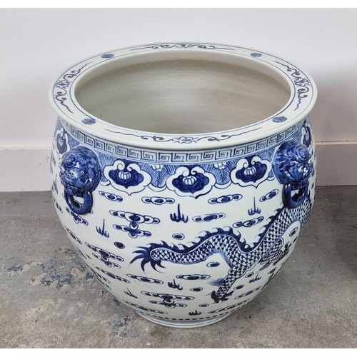 387 - PLANTERS, a pair, blue and white glazed ceramic, 42cm H x 46cm W. (2)