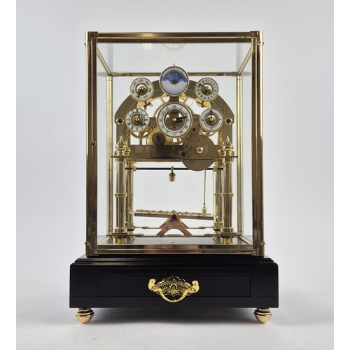 393 - CONGREVE MOON PHASE CLOCK, gilt metal and glass, 44cm H x 30cm W x 27cm D.