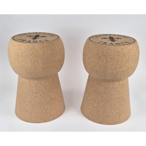 402 - STOOLS, a pair, in the form of champagne corks, 50.5cm H approx. (2)