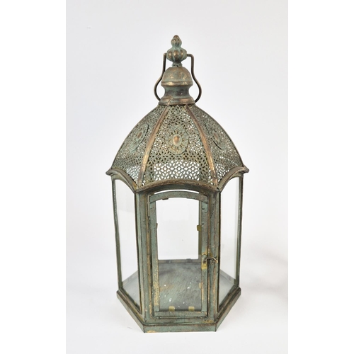 433 - STORM LANTERNS, a pair, faux Verdigris metal and glazed, 57cm H at tallest approx. (2)