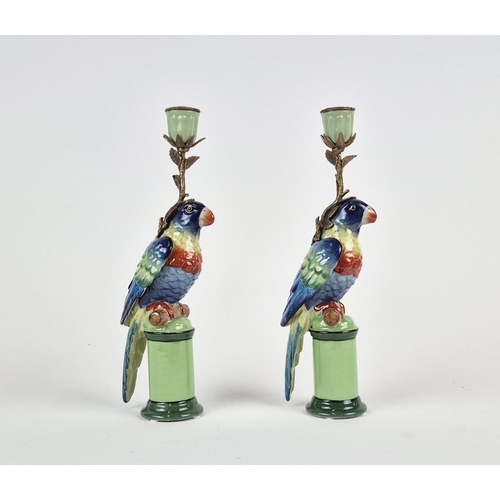 435 - CANDLESTICKS, a pair, in the form of blue parrots, ceramic and gilt metal, 31.5cm H approx. (2)