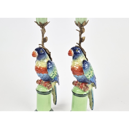 435 - CANDLESTICKS, a pair, in the form of blue parrots, ceramic and gilt metal, 31.5cm H approx. (2)