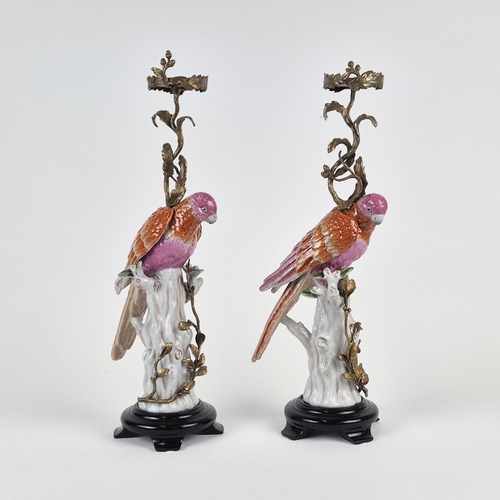 437 - CANDLESTICKS, a par, in the form of parrots, ceramic and gilt metal, 55cm H approx. (2)