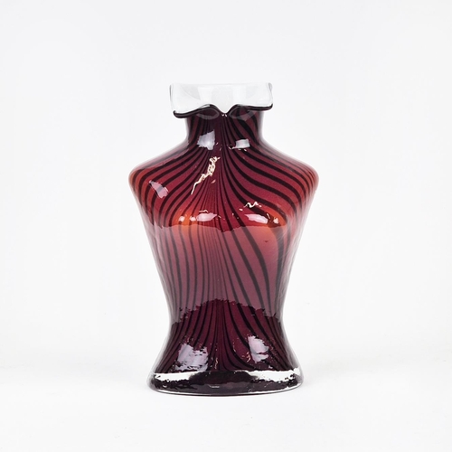 52 - A MURANO STYLE TORSO HAND BLOWN VASE, in the female form, red and black striped decoration, white op... 