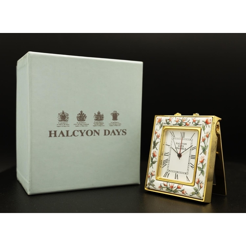 57 - HALCYON DAYS ENAMLES, comprising various quartz travelling clocks, a penhaligon's travelling clock, ... 