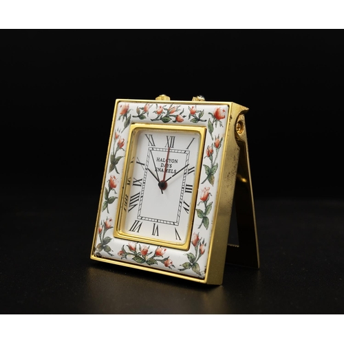 57 - HALCYON DAYS ENAMELS, comprising various quartz travelling clocks, a penhaligon's travelling clock, ... 