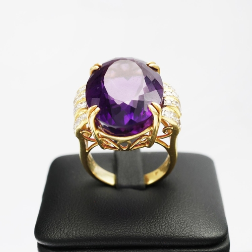 75 - AN 18CT GOLD AMETHYST AND DIAMOND RING AND EARRING SET, the clip-on earrings each set with a large o... 