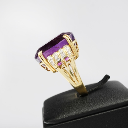 75 - AN 18CT GOLD AMETHYST AND DIAMOND RING AND EARRING SET, the clip-on earrings each set with a large o... 