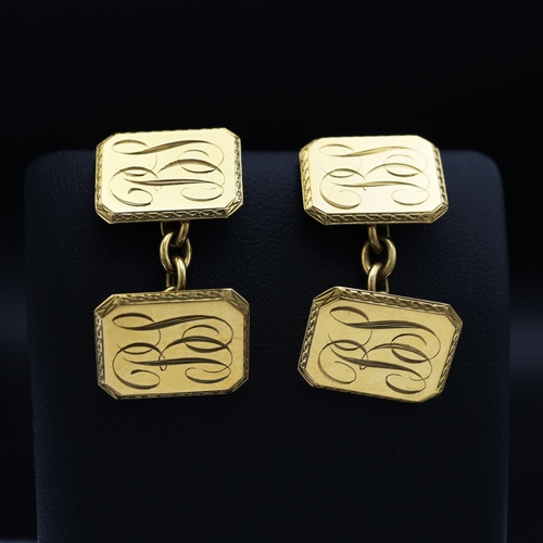 75A - A PAIR OF 9CT GOLD CUFFLINKS, inscribed scrolled initials, early 20th century, complete with origina... 