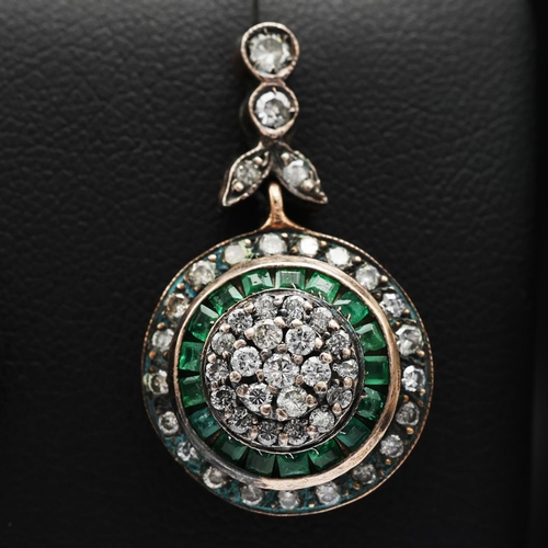 91 - A PAIR OF EMERALD AND DIAMOND PENDANT EARRINGS, rose yellow metal backs, each with a cluster of diam... 