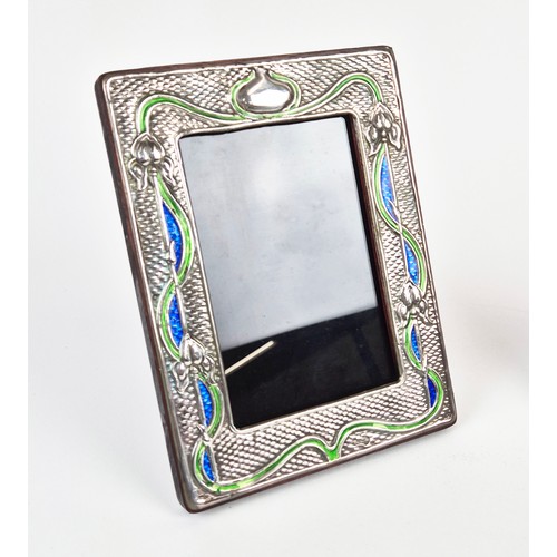 425 - PHOTO FRAMES, a pair, polished metal with enamel detail, 19.5cm x 14.5cm approx. (2)