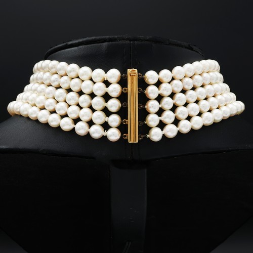 85 - A FIVE STRAND CULTURED PEARL CHOKER NECKLACE, having approximately 249 round 7mm pearls, yellow meta... 