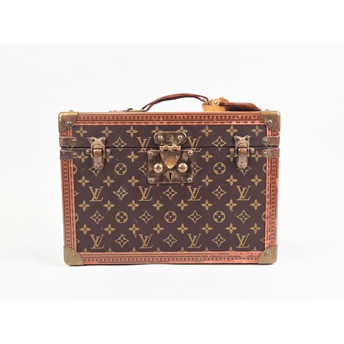 21A - LOUIS VUITTON BOÎTE À FLACONS VANITY CASE, monogram coated canvas exterior with logo stamped trim, b... 