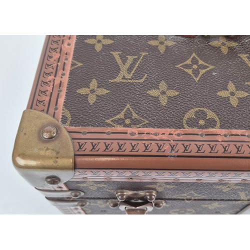 21A - LOUIS VUITTON BOÎTE À FLACONS VANITY CASE, monogram coated canvas exterior with logo stamped trim, b... 