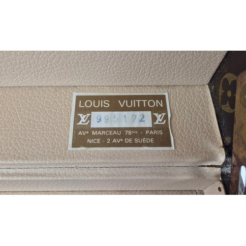 21A - LOUIS VUITTON BOÎTE À FLACONS VANITY CASE, monogram coated canvas exterior with logo stamped trim, b... 