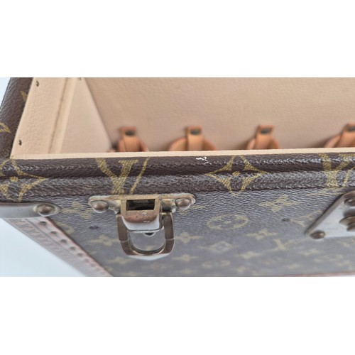 21A - LOUIS VUITTON BOÎTE À FLACONS VANITY CASE, monogram coated canvas exterior with logo stamped trim, b... 