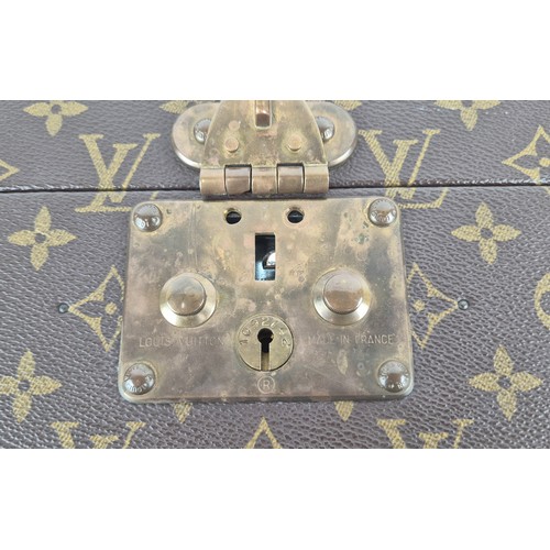 21A - LOUIS VUITTON BOÎTE À FLACONS VANITY CASE, monogram coated canvas exterior with logo stamped trim, b... 