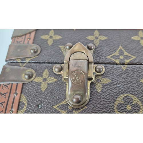 21A - LOUIS VUITTON BOÎTE À FLACONS VANITY CASE, monogram coated canvas exterior with logo stamped trim, b... 