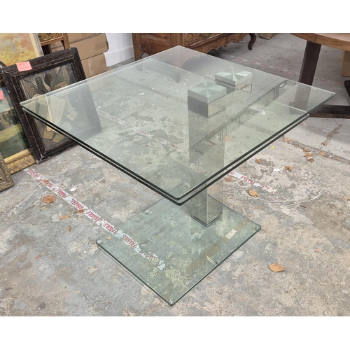 304 - GLASS DINING TABLE, swivel glass top extending 90cm D x 180cm fully extended.