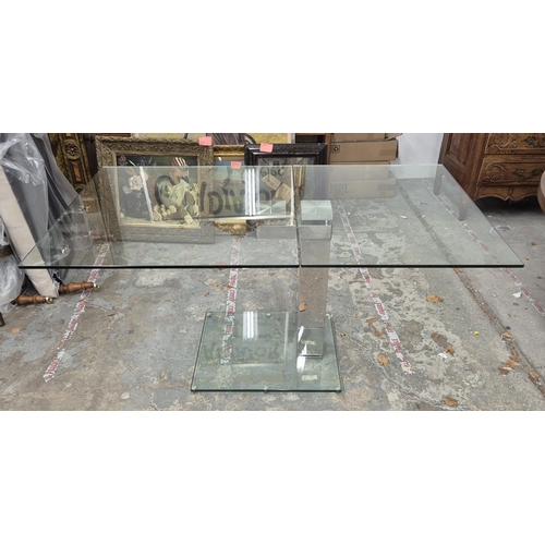 304 - GLASS DINING TABLE, swivel glass top extending 90cm D x 180cm fully extended.