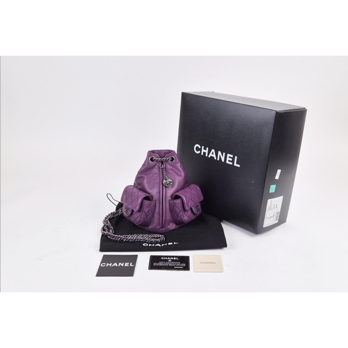 4 - CHANEL RARE MINI BACKPACK, purple calfskin leather from 2013 cruise collection, two external diamond... 