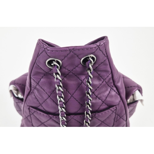 4 - CHANEL RARE MINI BACKPACK, purple calfskin leather from 2013 cruise collection, two external diamond... 