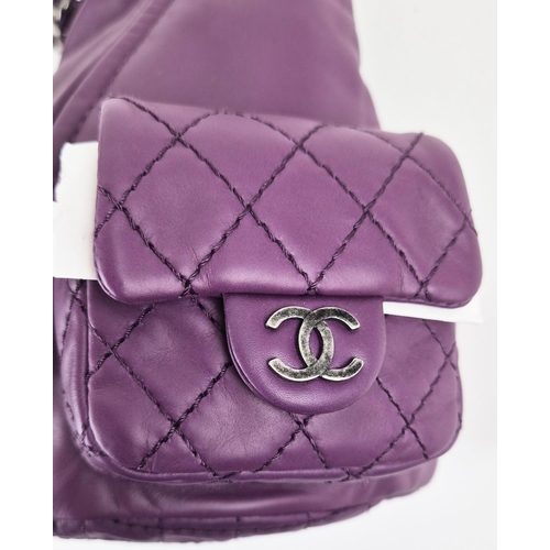 4 - CHANEL RARE MINI BACKPACK, purple calfskin leather from 2013 cruise collection, two external diamond... 