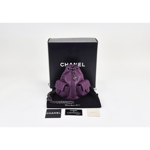 4 - CHANEL RARE MINI BACKPACK, purple calfskin leather from 2013 cruise collection, two external diamond... 