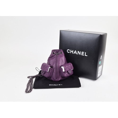 4 - CHANEL RARE MINI BACKPACK, purple calfskin leather from 2013 cruise collection, two external diamond... 