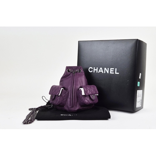 4 - CHANEL RARE MINI BACKPACK, purple calfskin leather from 2013 cruise collection, two external diamond... 