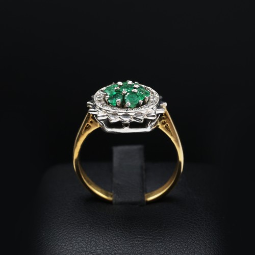 111 - AN 18CT GOLD EMERALD AND DIAMOND DRESS RING, mid 20th century, the platinum open backed setting with... 