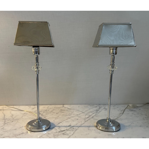 558 - TABLE LAMPS, a pair, chrome and glass columns, 47cm H. (2)