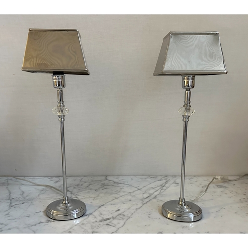 558 - TABLE LAMPS, a pair, chrome and glass columns, 47cm H. (2)