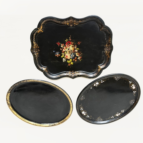 561 - PAPIER MÂCHÉ TRAYS, three 19th century gilt and polychrome floral decorated, largest 79cm W. (3)