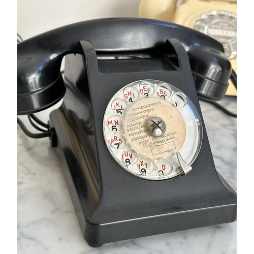 549 - TELEPHONES, three mid 20th century UK vintage bakelite including two white and one black. (3)