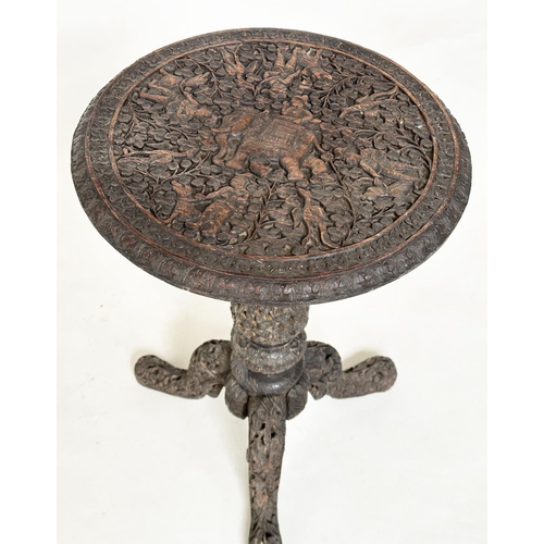 554 - BURMESE TABLE, 19th century Burmese intricately carved and pierced with tripod support and a similar... 