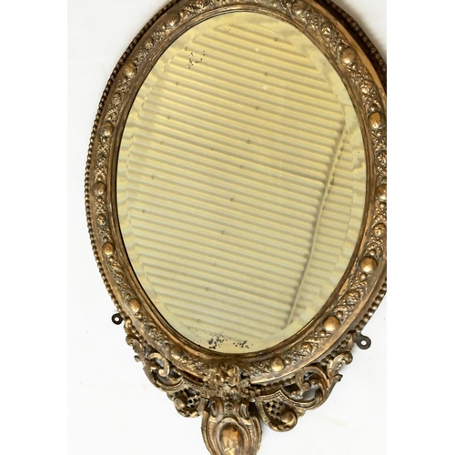 541 - WALL MIRROR, 19th century giltwood and gesso oval bevelled mirror with shield shaped base, 60cm W x ... 