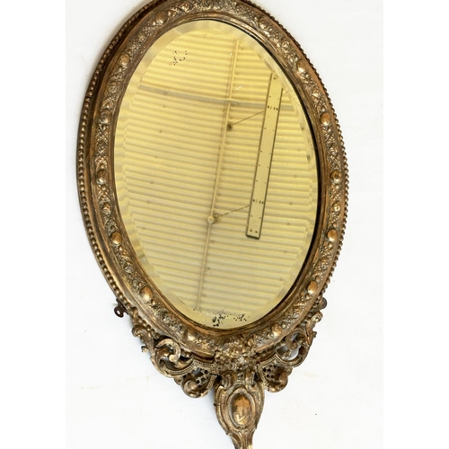 541 - WALL MIRROR, 19th century giltwood and gesso oval bevelled mirror with shield shaped base, 60cm W x ... 