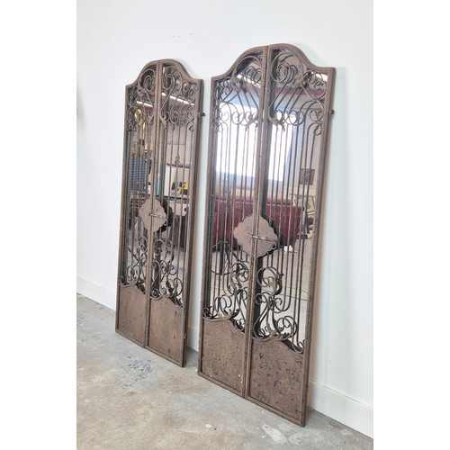 428 - ARCHITECTURAL WALL MIRRORS, a pair, gated design, 150cm x 60.5 approx. (2)