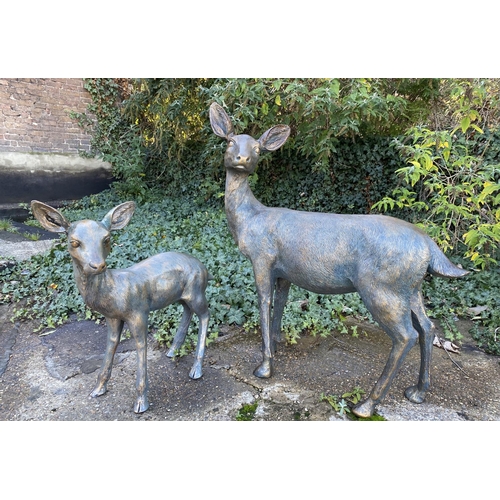 309 - DOE AND FAWN GARDEN SCULPTURES, a set of two bronzed finished resin, doe 90cm H x 80cm W x 35cm D, f... 