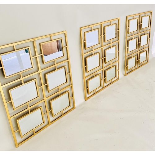 313 - WALL MIRRORS, a set of three, contemporary design gilt metal frames with multi sectional plates, 78c... 