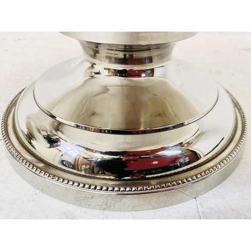 315 - PUNCH BOWLS, a pair, Regency style, polished metal. (2)