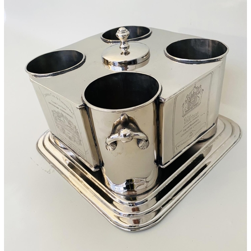 316 - WINE COOLER, polished metal, to hold four bottles.