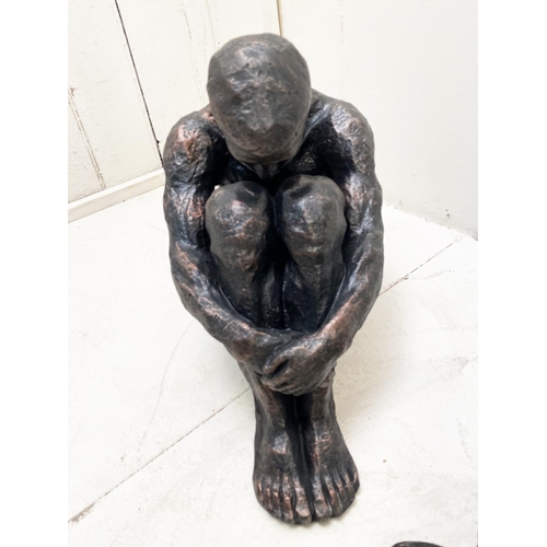 318 - CONTEMPORARY SITTING MAN SCULPTURES, a pair, resin, 34cm H x 21cm W x 40cm D. (2)