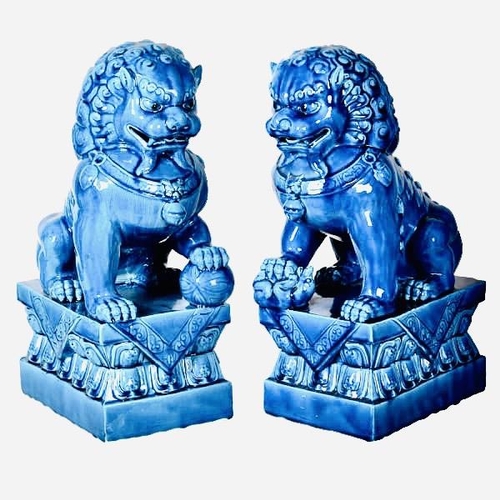 322 - FOO DOGS, a pair, Chinese style, cobalt blue glazed ceramic, 39cm H x 25cm W x 25cm D. (2)