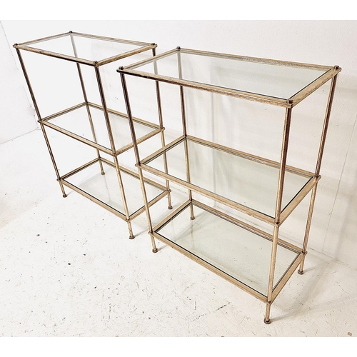 331 - ETAGERES, a pair, silvered metal with three glass tiers, 86cm H x 61cm W x 31cm D. (2)