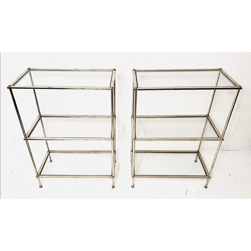 331 - ETAGERES, a pair, silvered metal with three glass tiers, 86cm H x 61cm W x 31cm D. (2)