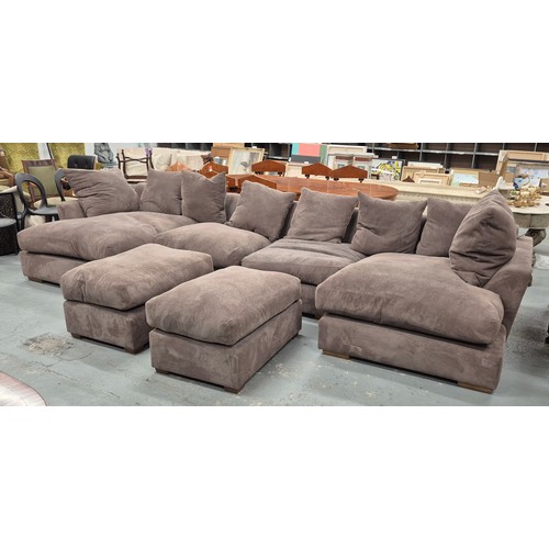 347 - MODULAR SOFA, of very large proportions with footstools, from Collins and Hayes 420cm W x 75cm H.